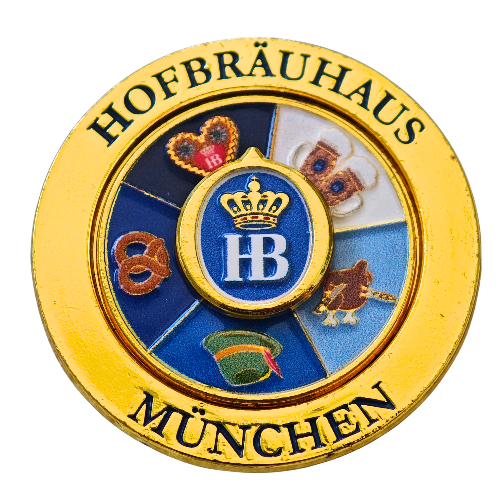 Runder Magnet im Goldglanz mit Hofbräuhaus München Logo und Glücksrad-Design, verziert mit bunten Symbolen wie Breze, Lebkuchenherz, Maßkrüge, Hut 